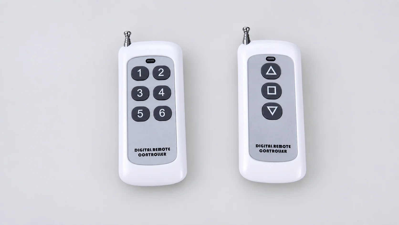 White six-button and three-button remote controls with their original button markings