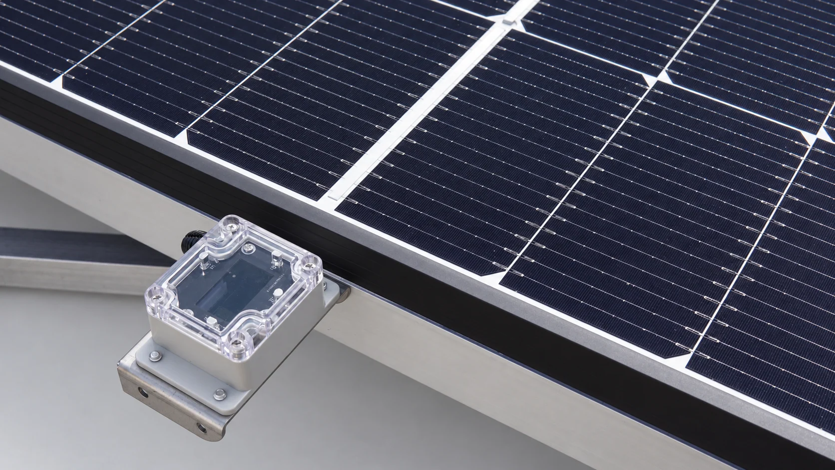 Clear-cover sensor module mounted at the photovoltaic panel edge